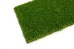 Dluxe 40mm Artificial Grass – Detailed Close-Up of Soft, Three-Tone Green & Brown Thatch Fibers